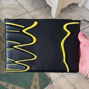 Giveaway creatures of the wind, leather clutch